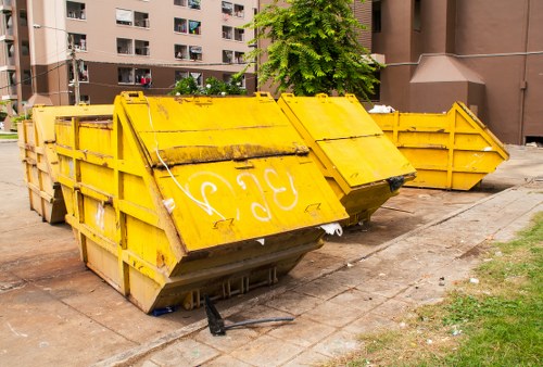 Cleanup crew handling household waste in Camdentown