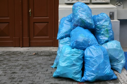 Professional waste clearance team assessing a construction site